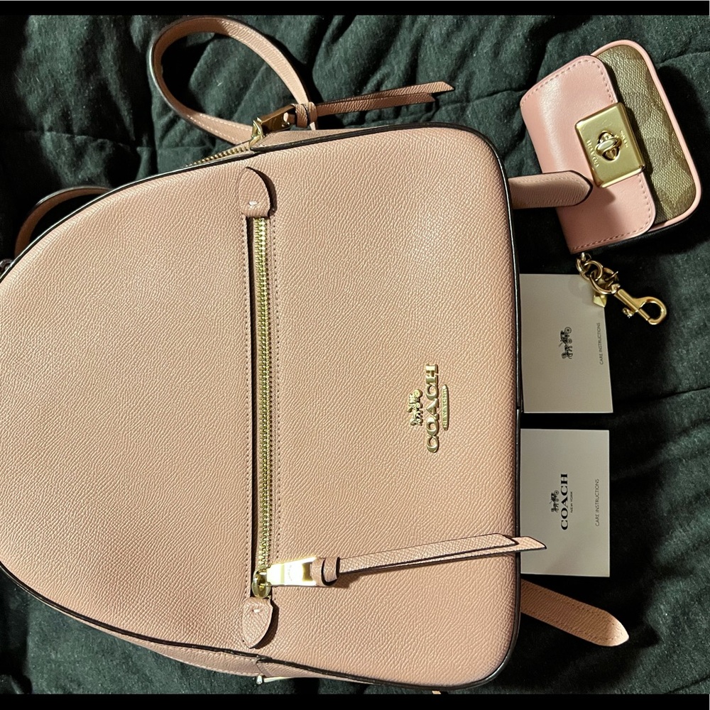 Light pink Coach backpack purse